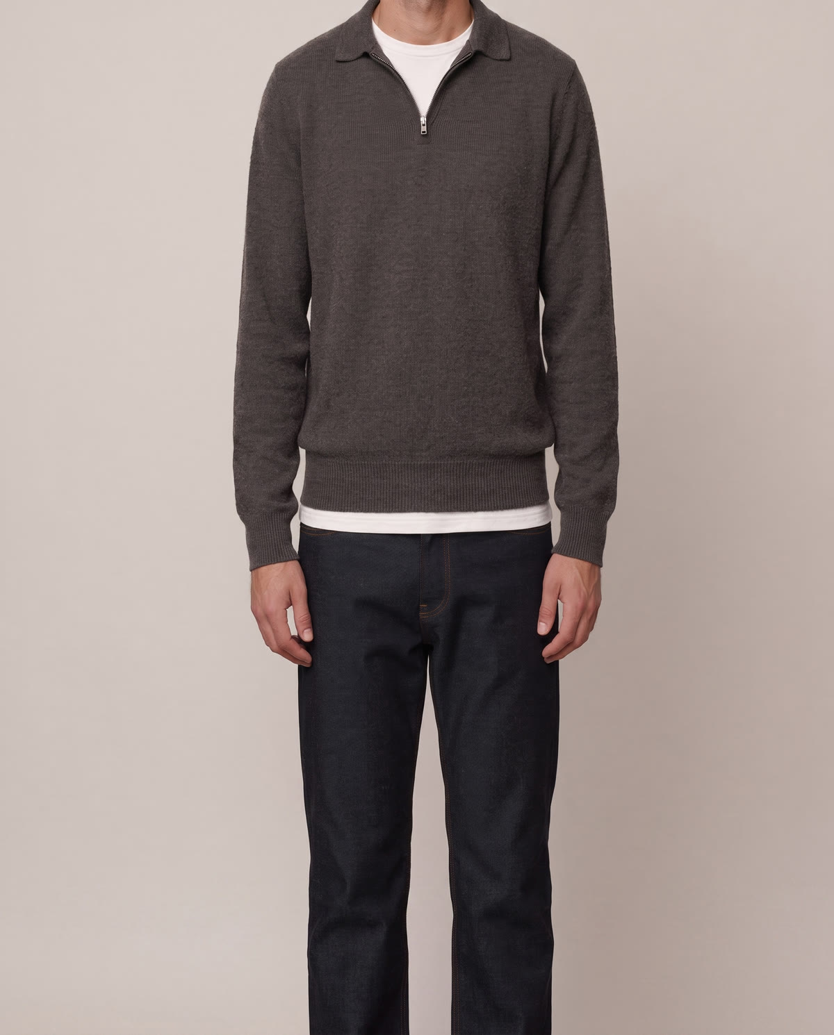 tall-layering-quarter-zip-fit - The Tall Take A tall man wearing a charcoal quarter-zip sweater over a white tee, showing correct body length